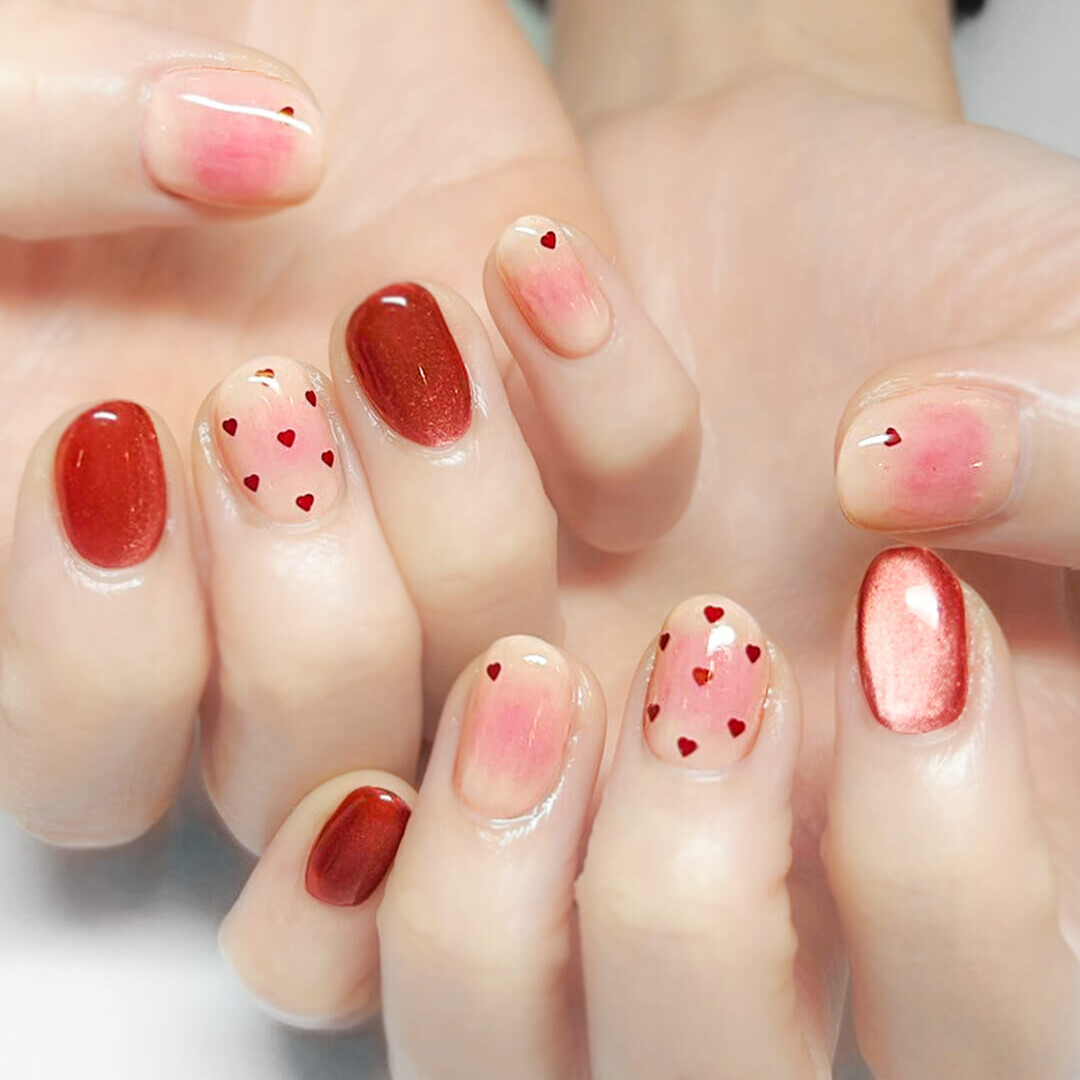 ほんのり色づいたピンクピーチネイル