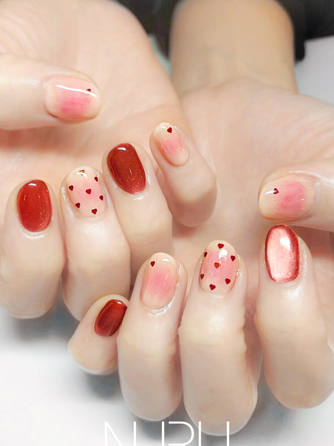 ほんのり色づいたピンクピーチネイル