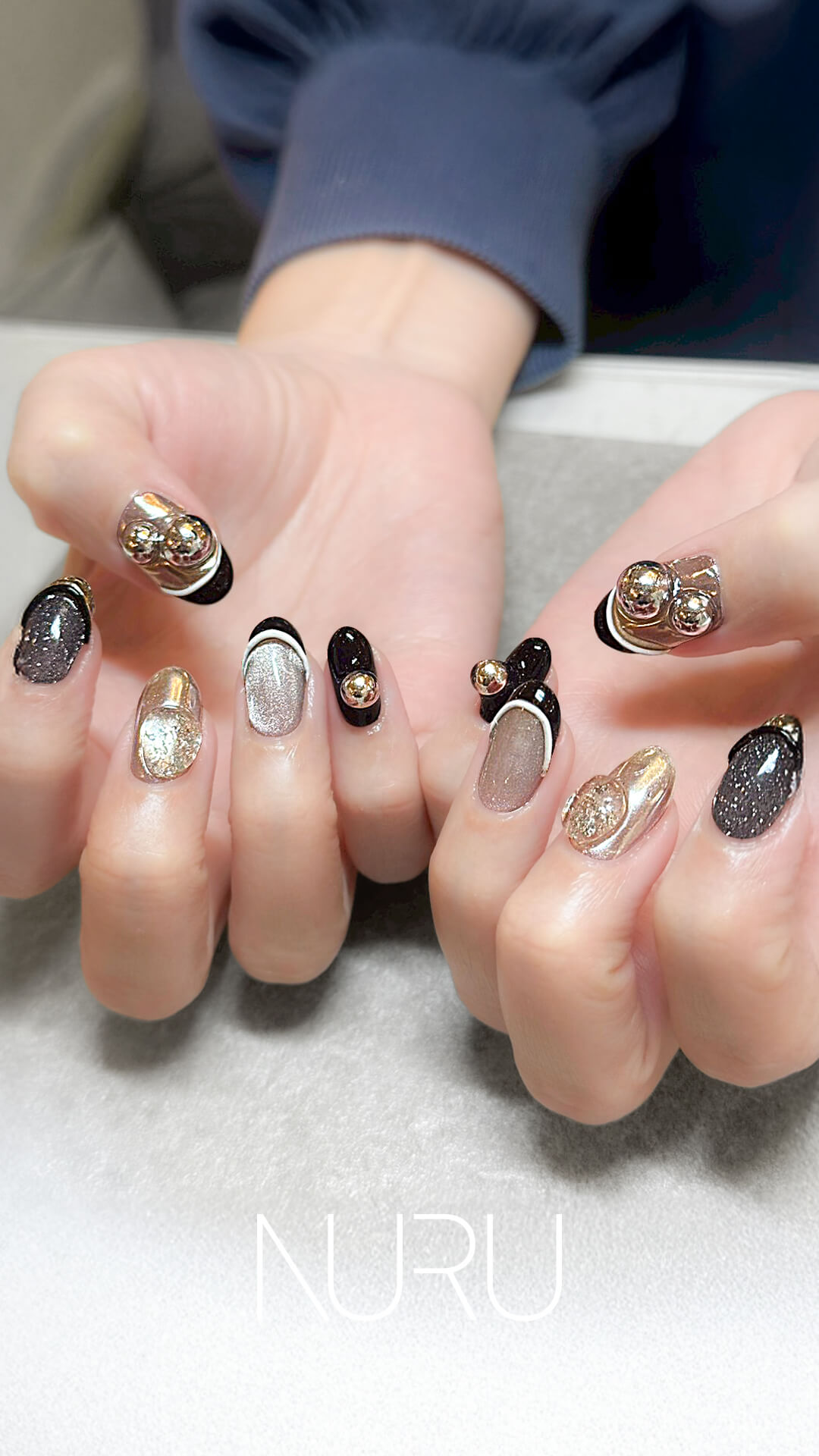 大胆パーツ!NURUのブラック×モード系ネイル